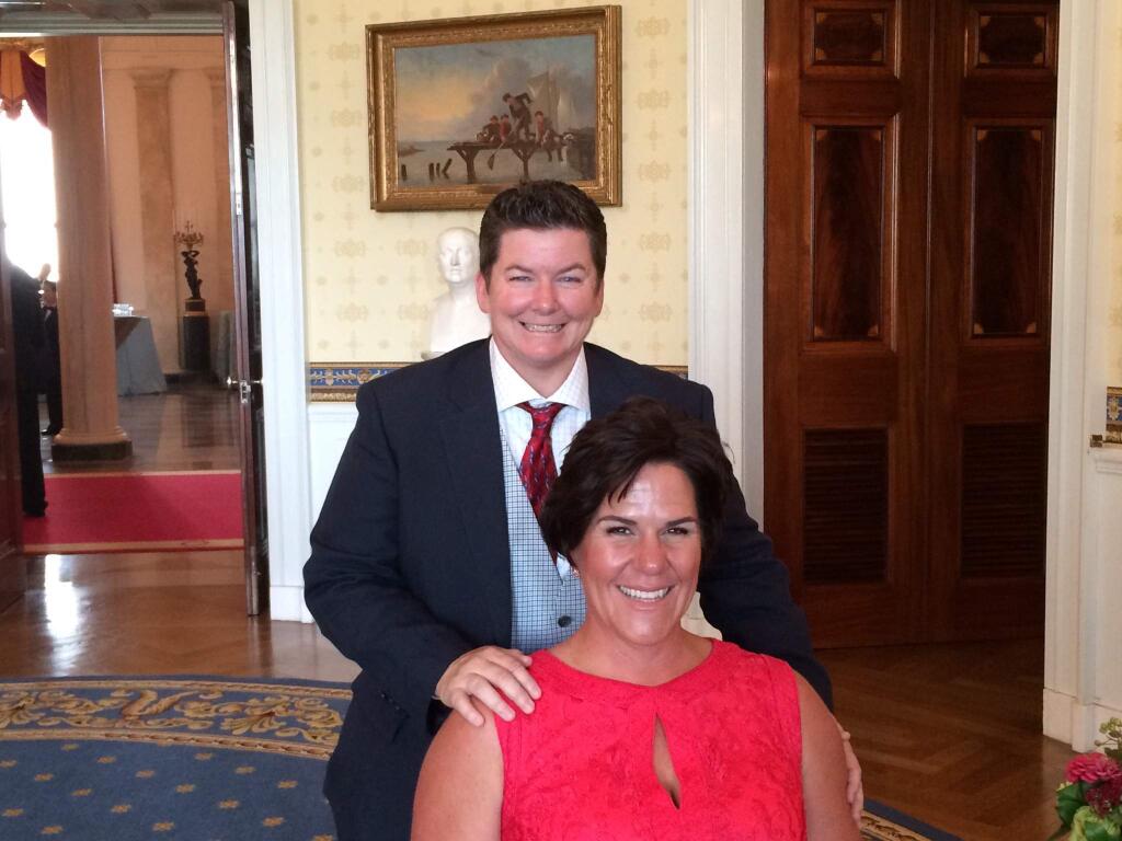 Naomi E. Metz, a Santa Rosa lawyer and LGBT activist, seated right, visited the White House on Wednesday, June 24, 2015, with her wife, Jennifer Foley. (COURTESY OF NAOMI E. METZ)