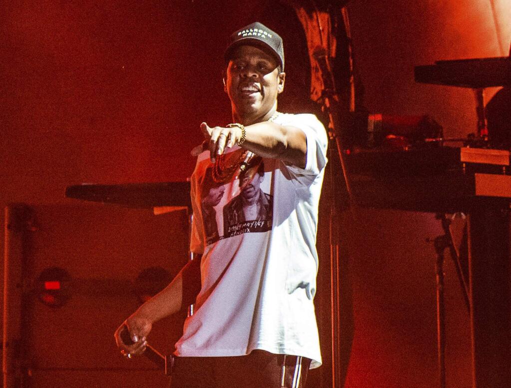 FILE - In this Oct. 13, 2017, file photo, Jay-Z performs at the Austin City Limits Music Festival in Austin, Texas. The rapper was nominated for eight Grammy nominations on Tuesday, Nov. 28. The 60th Annual Grammy Awards will air on CBS, Sunday, Jan. 28, 2018 in New York. (Photo by Amy Harris/Invision/AP, File)