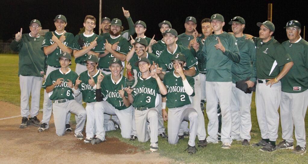 Bill Hoban/Index-TribuneThe Dragons show iff their trophy during pictures after they won their SCL tournament title Thursday evening beating Analy 12-5.