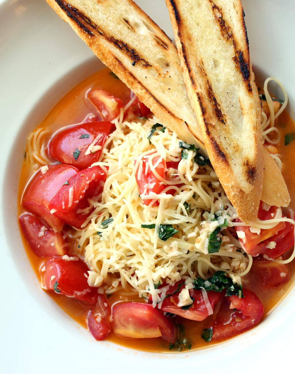 Tomato Basil Pasta served at The Hole in the Wall Restaurant in Sebastopol, Friday, July 11, 2014. (Crista Jeremiason / The Press Democrat)