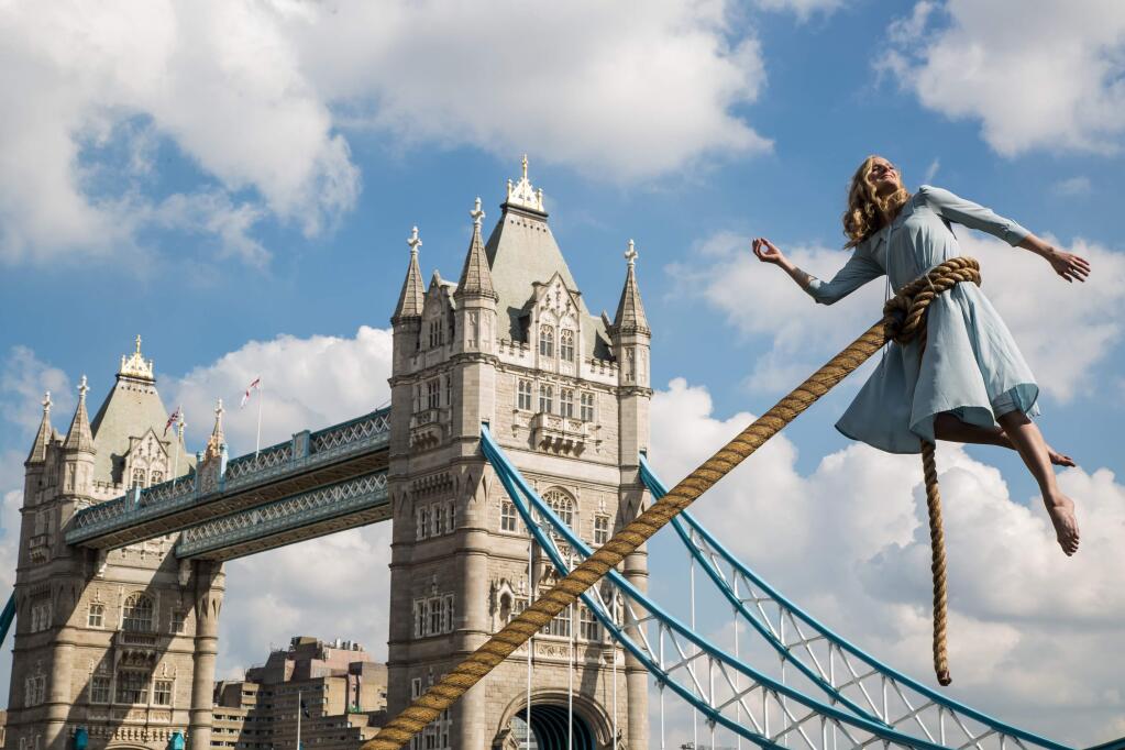 Aerialist Sally Miller takes part in a stunt to promote the upcoming release of the film 'Miss Peregrine's Home for Peculiar Children', in London, Wednesday, Sept. 21, 2016. (Photo by Vianney Le Caer/Invision/AP)