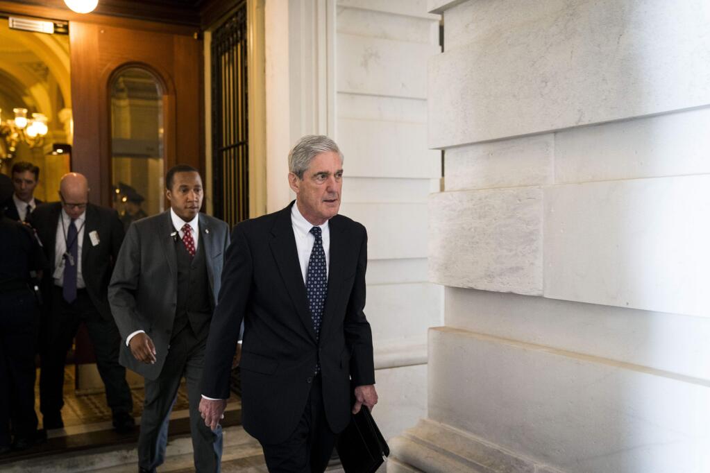 Special counsel Robert Mueller leaves the Capitol after a meeting. (DOUG MILLS / New York Times, 2017)