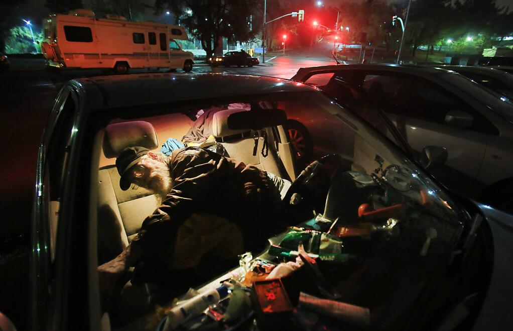 The Safe Parking Program, provides safe locations for families and individuals who are sleeping in their vehicles. There are currently about 8 sites around the Santa Rosa area managed by Catholic Charities. (Kent Porter / Press Democrat, 2016)