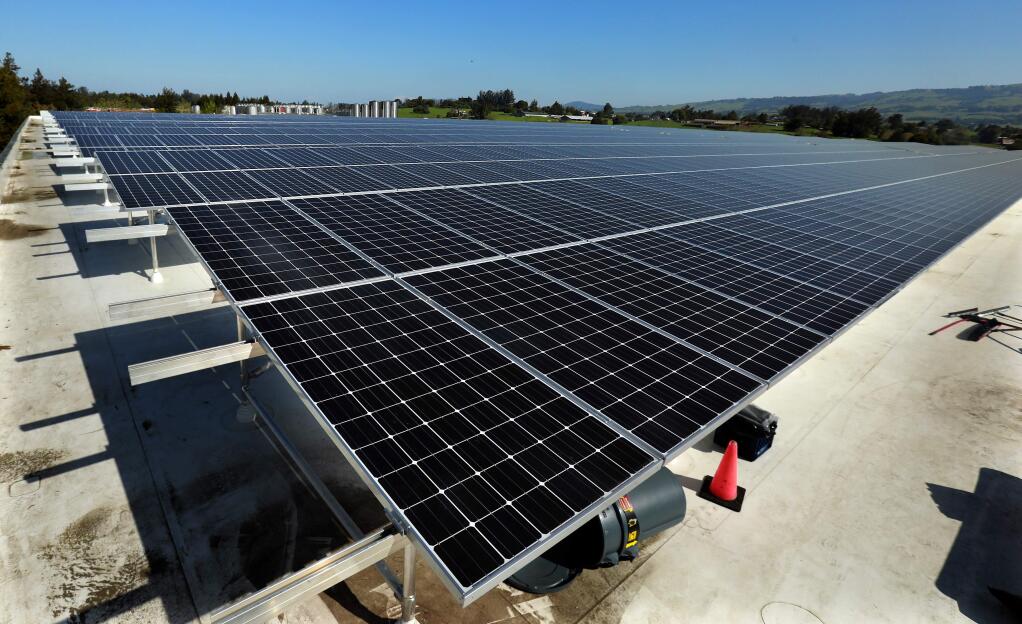 Rohnert Park's Westcoast Solar Energy company is installing a 2.15 megawatt system at Lagunitas Brewing in Petaluma . (John Burgess/The Press Democrat)