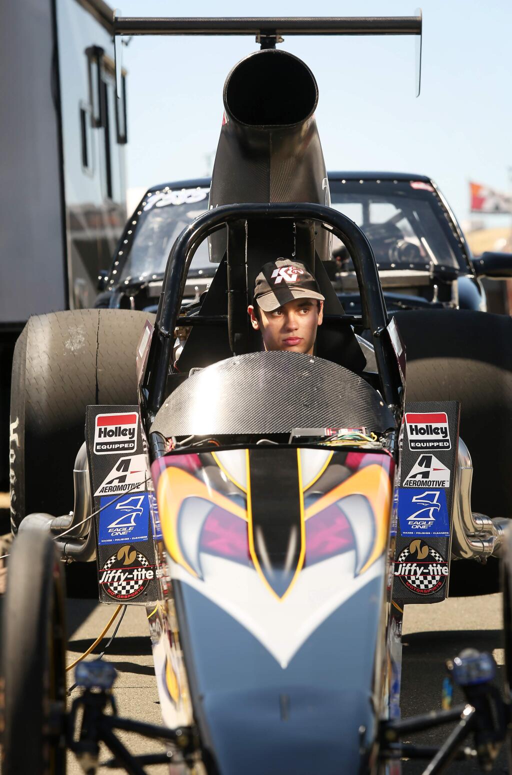 Drag racer Marko Perivolaris goes through his preparations to run his dragster at Sonoma Raceway on Thursday, July 18, 2013. (Conner Jay / The Press Democrat)