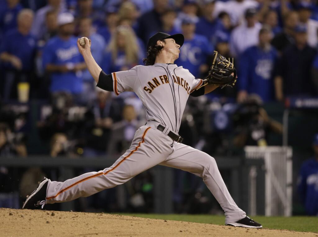 San Francisco Giants pitcher Tim Lincecum pitches during the eighth inning of Game 2 of baseball's World Series against the Kansas City Royals Wednesday, Oct. 22, 2014, in Kansas City, Mo. (AP Photo/Charlie Neibergall)