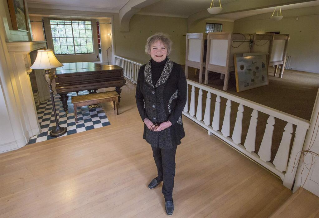 Jack London State Historic Park executive director Tjiska Van Wyk stands in the room that was once Chairman London's bedroom in the House of Happy Walls, designed to be a museum as well as a home. Display cabinets have been moved to make way for updating and renovations, which will take several months. to complete.(Photo by Robbi Pengelly/Index-Tribune)