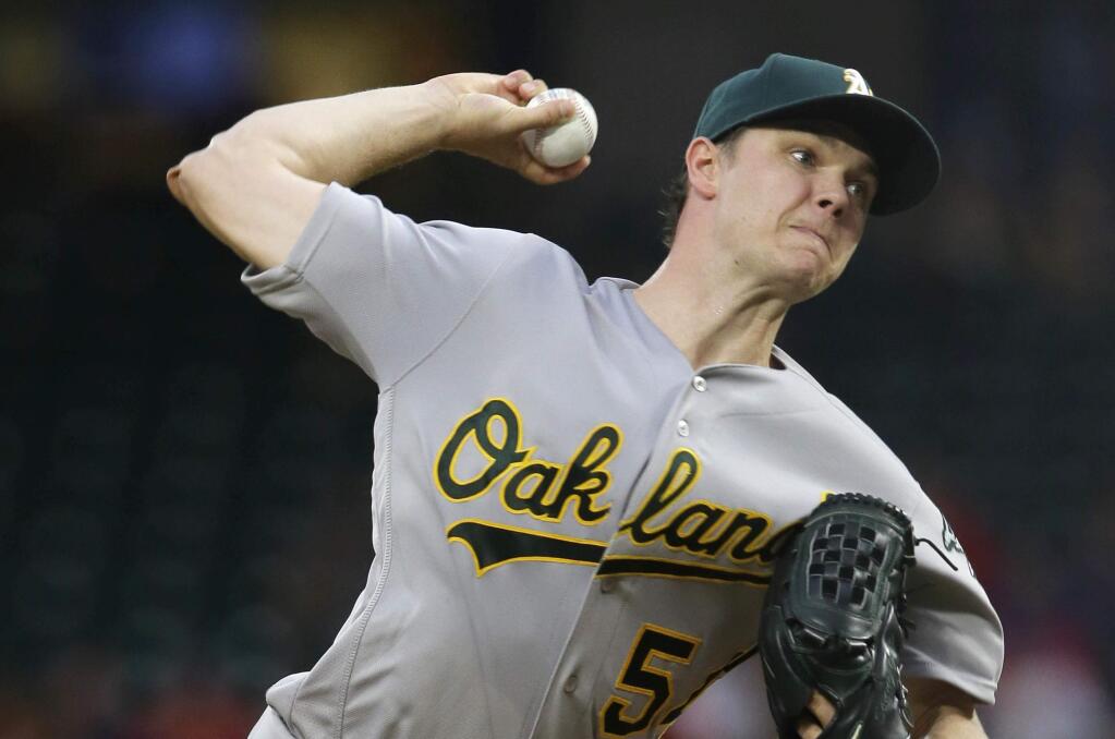 Oakland Athletics starting pitcher Sonny Gray throws during the first inning against the Texas Rangers in Arlington, Texas, Tuesday, July 26, 2016. (AP Photo/LM Otero)