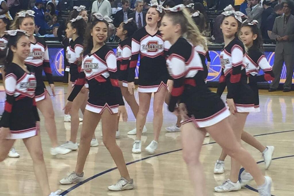 The Stallions cheerleading squad from Santa Rosa performed at halftime of the Warriors game at Oracle Arena on Monday, March 7, 2016.
