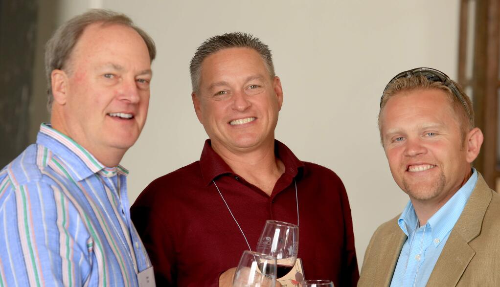 Steve Falk, Brendan Roche and Michael Carr attend the Press Democrat North Coast Wine Challenge, Sunday May 17, 2015 at the Barlow Center in Sebastopol. (Kent Porter / Press Democrat) 2015