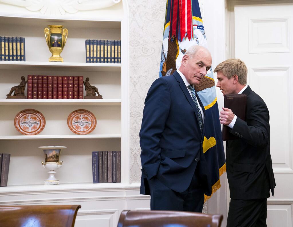 FILE -- White House Chief of Staff John Kelly, left, speaks with Nick Ayers, Vice President Mike Pence's chief of staff, in the Oval Office of the White House, in Washington, Aug. 27, 2018. Ayers, 36, President Donald Trump's top choice to replace Kelly as chief of staff, has declined to take the job, according to three people familiar with the talks. (Doug Mills/The New York Times)