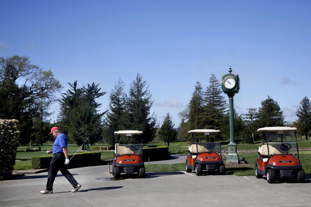 Rick Lederman heads toward the driving range at Santa Rosa Golf & Country Club in Santa Rosa, on Tuesday, March 22, 2016. (BETH SCHLANKER/ The Press Democrat)