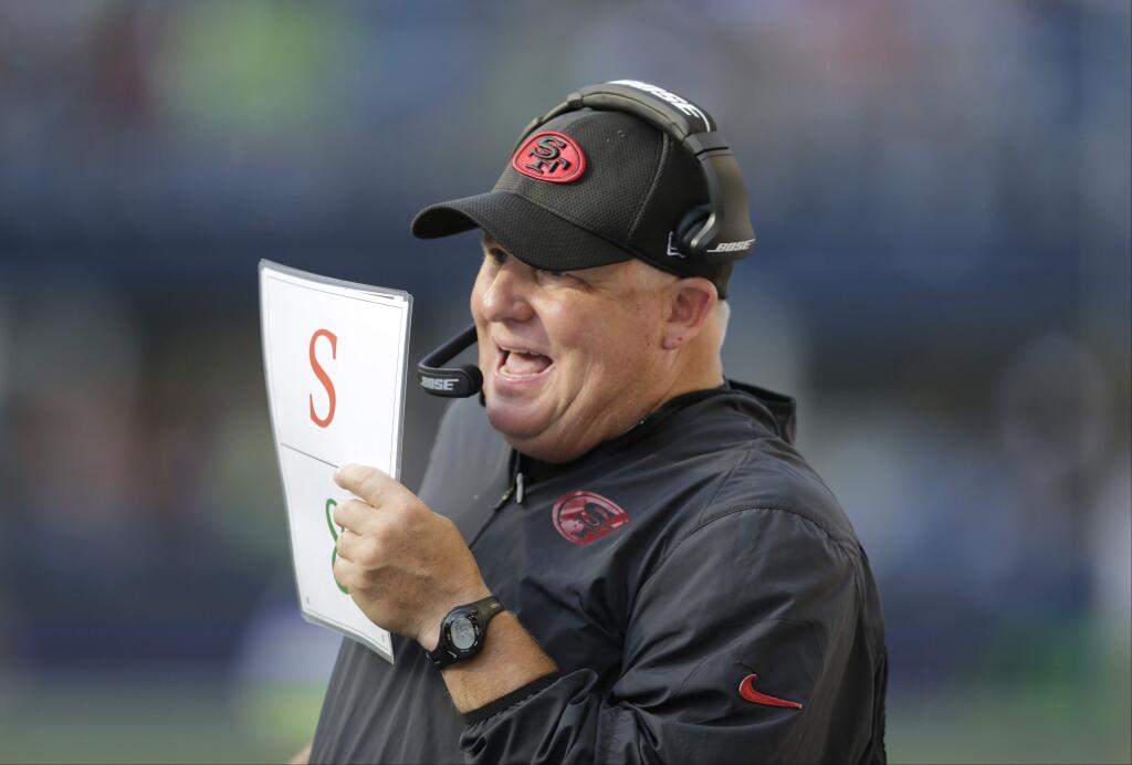 San Francisco 49ers head coach Chip Kelly looks on from the sidelines against the Seattle Seahawks in the second half of an NFL football game, Sunday, Sept. 25, 2016, in Seattle. The Seahawks won 37-18. (AP Photo/John Froschauer)