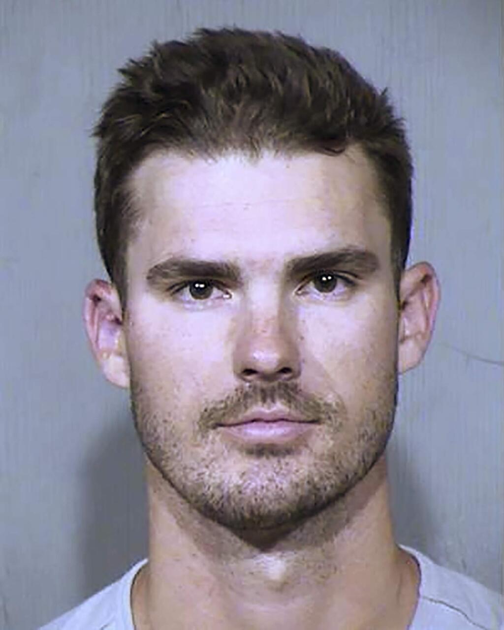 This Oct. 6, 2019, booking photo provided by the Maricopa County Sheriff's Office in Phoenix shows San Diego Padres pitcher Jacob Nix. Police say Nix was arrested for trying to crawl through the doggie door of a home in the Phoenix suburb of Peoria, Ariz. (Maricopa County Sheriff's Office via AP)