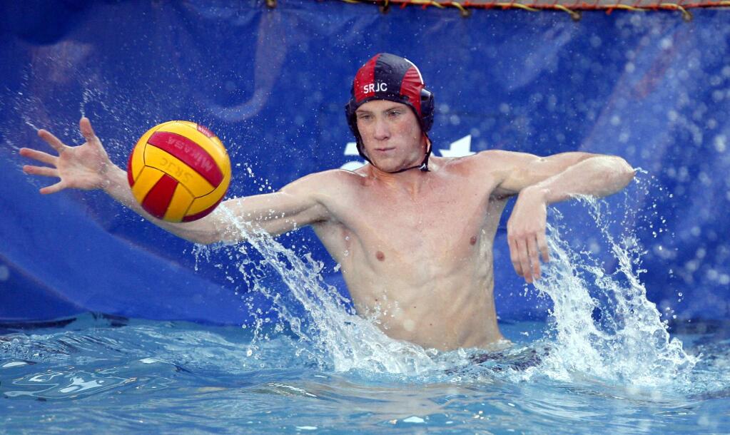 Sonoma's Jack Curley blocks a shot as a SRJC water polo goalie in 2006; he's now leading the Olympic Club in international competition in Budapest, Hungary. (The Press Democrat) / Crista Jeremiason)