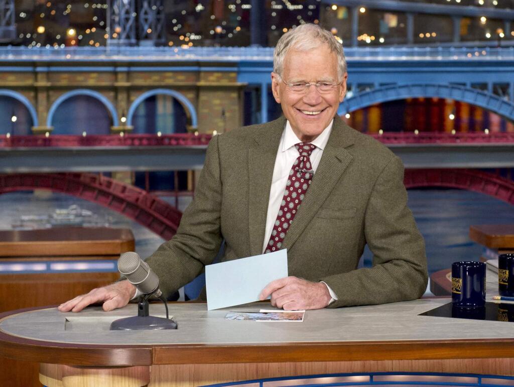 FILE - In this April 3, 2014 file photo provided by CBS, David Letterman, host of the 'Late Show with David Letterman,' smiles after announcing his retirement during a taping in New York. Letterman will host his final show on May 20. (AP Photo/CBS, Jeffrey R. Staab)
