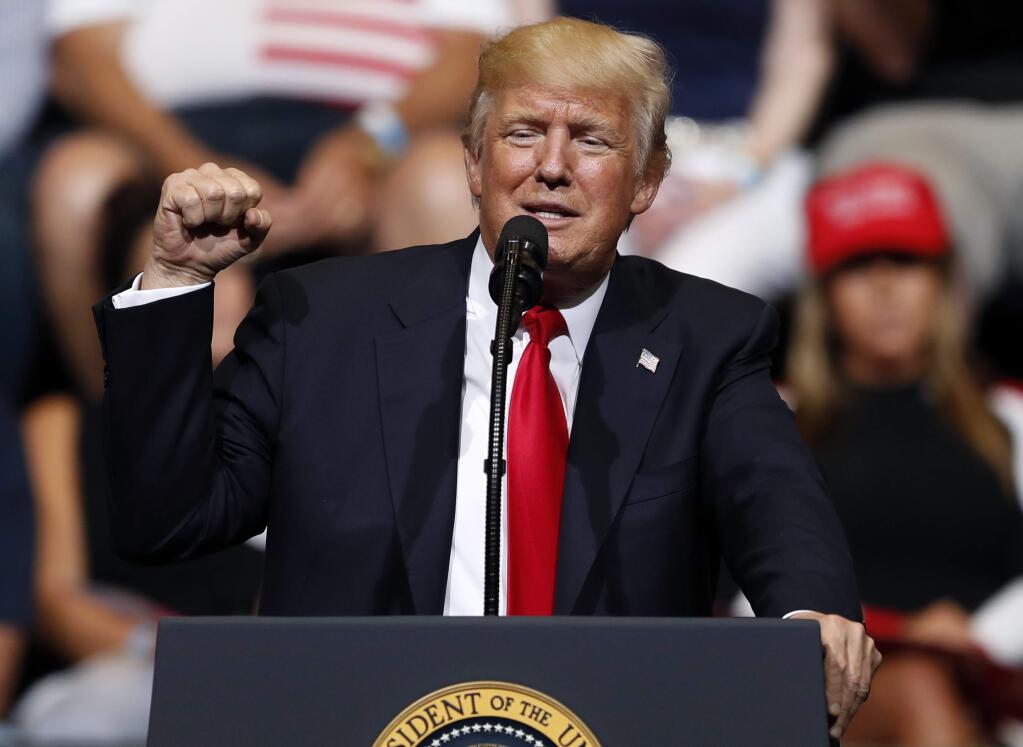 President Donald Trump speaks during a rally, Wednesday, June 21, 2017, in Cedar Rapids, Iowa. (AP Photo/Charlie Neibergall)