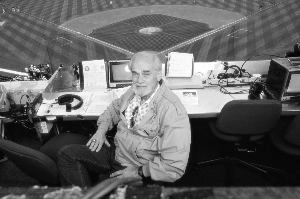 Bill King in the broadcast booth in 1999.