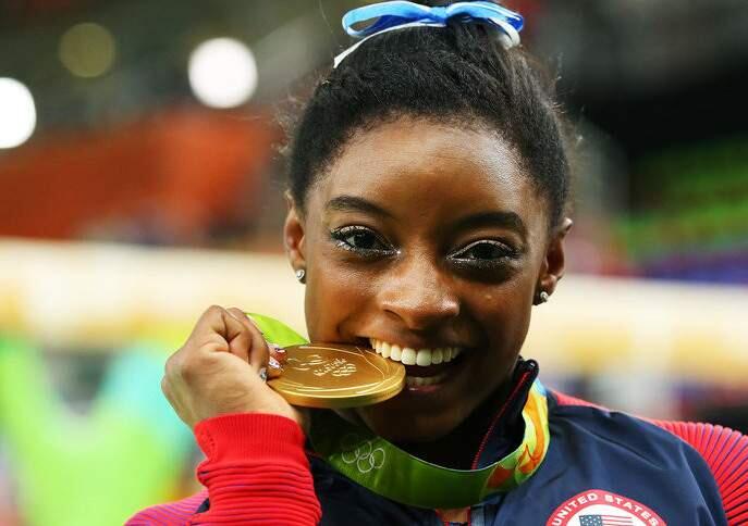 Olympic gymnast Simone Biles was chewing on more than protein bars this summer in Rio.