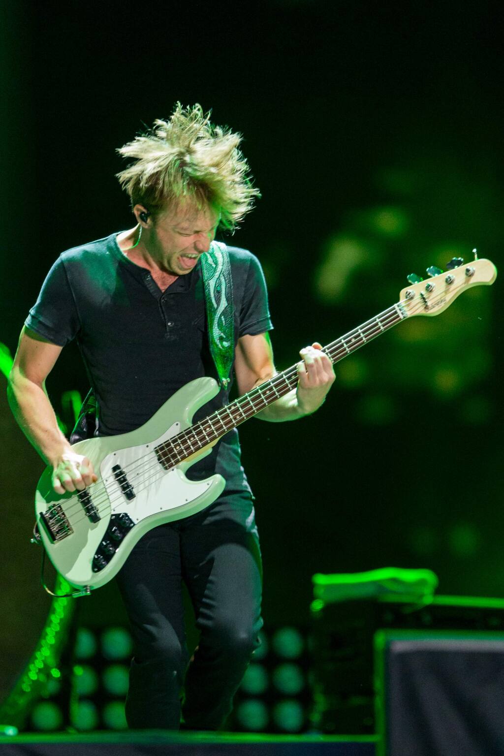 Ben McKee of Imagine Dragons perform on stage during the Made In America Festival at Grand Park on Saturday, August 30, 2014, in Los Angeles, Calif. (Photo by Paul A. Hebert/Invision/AP)