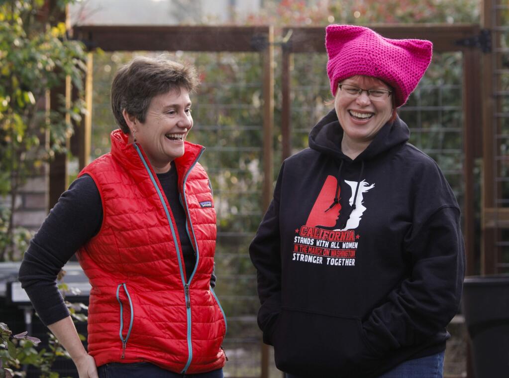 Petaluma, CA, USA. Tuesday, January 16, 2017._ Friends, Michele Larkey, 50 (left) and Karen Curry, 58 (right) plan to participate in the Women's Marches this weekend. Michele is going to Santa Rosa and Karen is going to fly to Washington, DC., where the presidential inauguration will take place on Friday. (CRISSY PASCUAL/ARGUS-COURIER STAFF)