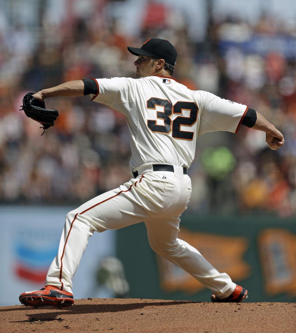 San Francisco Giants pitcher Ryan Vogelsong works against the St. Louis Cardinals in the first inning of a baseball game Saturday, Aug. 29, 2015, in San Francisco. (AP Photo/Ben Margot)