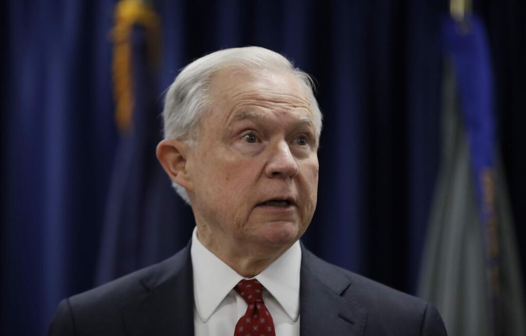 FILE - In this July 21, 2017 file photo, Attorney General Jeff Sessions speaks in Philadelphia. President Donald Trump took a new swipe at on Monday, July 24, 2017, referring to him in a tweet as “beleaguered” and wondering why Sessions isn't digging into Hillary Clinton's alleged contacts with Russia. (AP Photo/Matt Rourke, File)