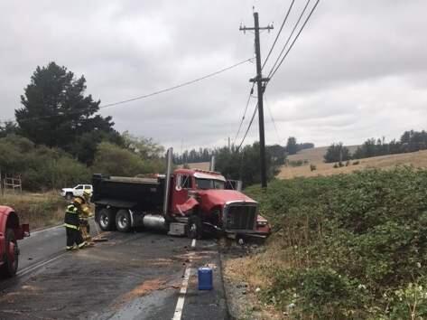 One person was sent to the hospital after a head-on crash involving a dump truck and a sedan on Bodega Avenue northwest of Petaluma on Tuesday, Aug. 28. 2018. (COURTESY OF WILMAR FIRE CHIEF MIKE MICKELSON)