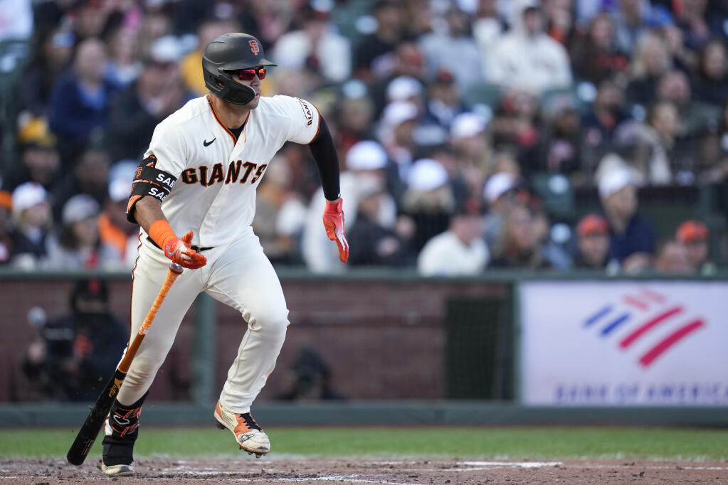 San Francisco Giants' Blake Sabol watches his RBI-single against the New York Mets during the fourth inning of a baseball game in San Francisco, Sunday, April 23, 2023. (AP Photo/Godofredo A. Vásquez)