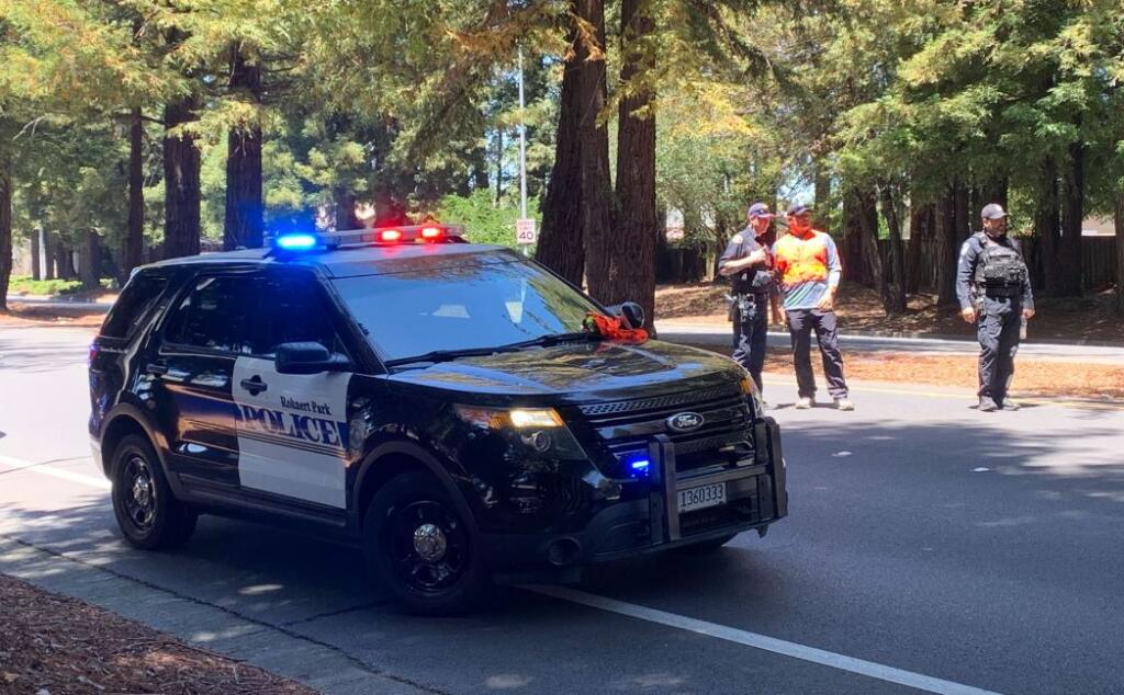 Police at the scene of a crash that killed a pedestrian in Rohnert Park on Friday, July 1, 2022. (Colin Atagi / The Press Democrat)