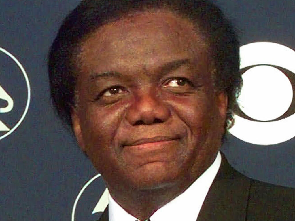 FILE - Songwriter/producer Lamont Dozier appears at the 40th Annual Grammy Awards in New York on Feb. 25, 1998. Dozier, of the celebrated Holland-Dozier-Holland team that wrote and produced “You Can’t Hurry Love,” “Heat Wave” and dozens of other hits and helped make Motown an essential record company of the 1960s and beyond, has died at age 81.  (AP Photo/Richard Drew, File)
