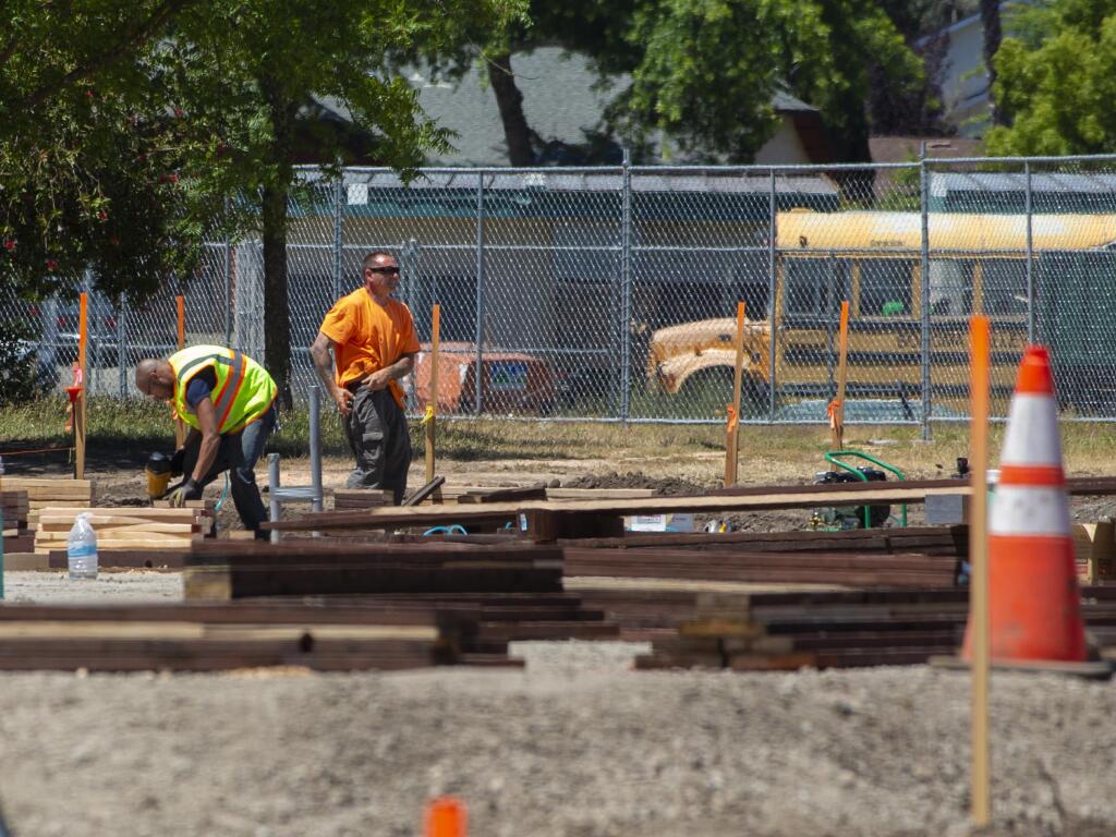 At issue is whether Sonoma Valley Unified will only contract with businesses that employ union construction workers going forward. Construction projects with heavy machinery vies for space next to playground equipment at El Verano Elementary School in Boyes Hot Springs in 2019. (Photo by Robbi Pengelly/Index-Tribune)