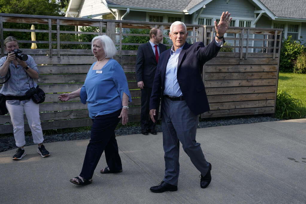 Former Vice President Mike Pence arrives at a meet and greet, Tuesday, May 23, 2023, in Des Moines, Iowa. (AP Photo/Charlie Neibergall)