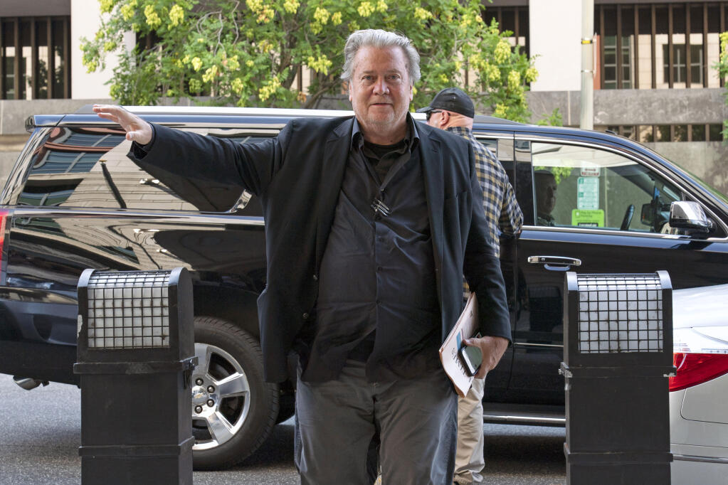 Former White House strategist Steve Bannon arrives at the federal court in Washington, Thursday, July 21, 2022. Bannon, a one-time adviser to former President Donald Trump, faces criminal contempt of Congress charges after refusing for months to cooperate with the House committee investigating the Jan. 6, 2021, Capitol insurrection. (AP Photo/Jose Luis Magana)