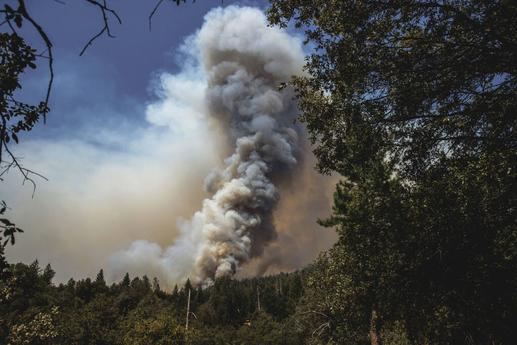 The Oak Fire burns in unincorporated Mariposa County, Calif., on Sunday, July 24, 2022. (Ethan Swope/San Francisco Chronicle via AP)
