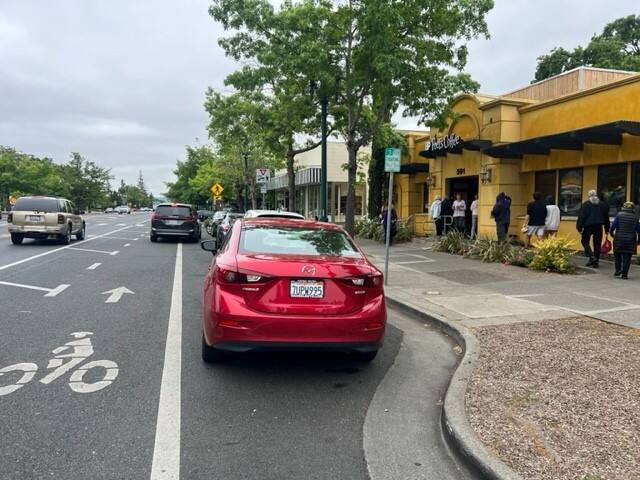 Cars can often be seen blocking the bike lanes during the morning rush at Peet’s on Broadway in Sonoma. (Emily Charrier/Index-Tribune)