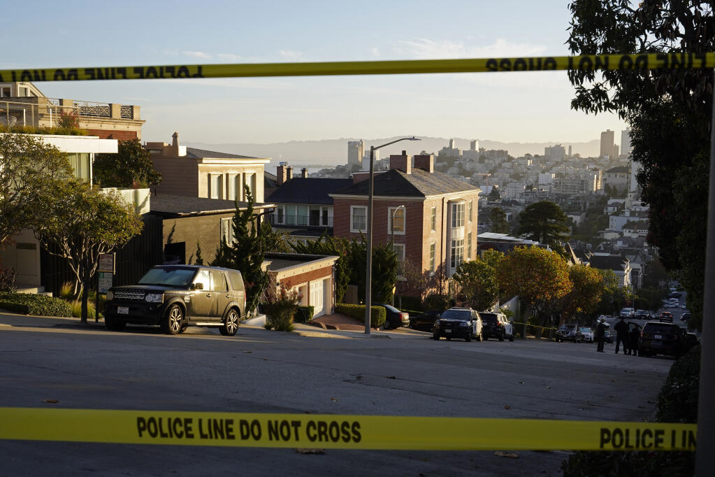 Police tape blocks a street outside the home of House Speaker Nancy Pelosi and her husband Paul Pelosi in San Francisco, Friday, Oct. 28, 2022. Paul Pelosi, was attacked and severely beaten by an assailant with a hammer who broke into their San Francisco home early Friday, according to people familiar with the investigation. (AP Photo/Eric Risberg)