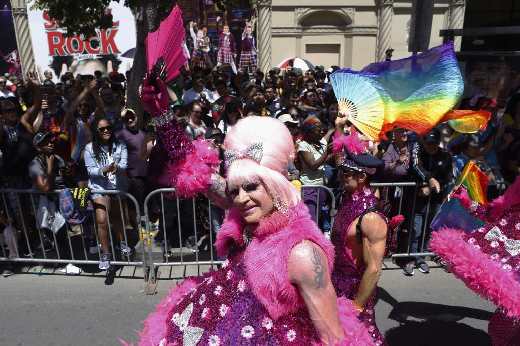 Pride Parade performers march down Market Street in San Francisco on Sunday, June 24, 2018. (/San Francisco Chronicle via AP)