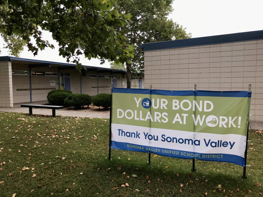 Signs adorning campuses around town that residents can now see their bond dollars at work.