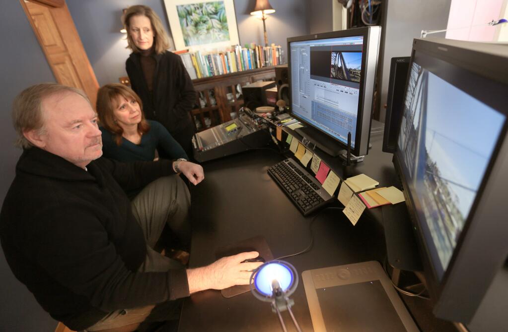 1/10/2015:B1:YEARS IN THE MAKING: William Sorensen, left, Nancy Econome and Stella Kwiecinski review the film they made about the Russian River in Santa Rosa on Friday. The two-hour documentary both describes past exploitation of the waterway and highlights its beauty and importance to wildlife and humans.KENT PORTER / The Press DemocratPC:Previewing their work, William Sorensen from left, Nancy Ecome and Stella Kwiecinski collaborated on a film about the Russian River watershed, Friday Jan. 9, 2015 in Santa Rosa.. (Kent Porter / Press Democrat) 2015