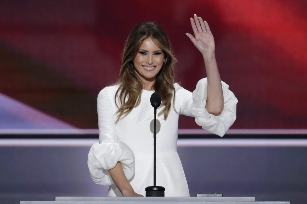 Melania Trump, wife of Republican Presidential Candidate Donald Trump waves as she speaks during the opening day of the Republican National Convention in Cleveland, Monday, July 18, 2016. (AP Photo/J. Scott Applewhite)