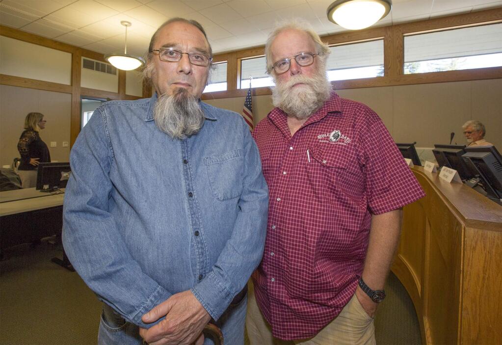 Vice-chair Ken Brown, left, and chair Fred Allebach, of the Community Services and Environment Commission before a meeting in the City Council Chambers on Wednesday, June 13. (Photo by Robbi Pengelly/Index-Tribune)