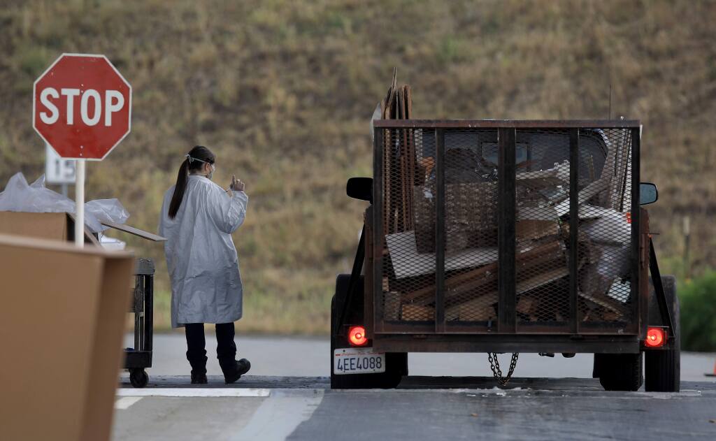 Sonoma County residents drop off their hazardous waste at the Republic Services of Sonoma County Inc. Central Landfill, Saturday, May 16, 2020. (Kent Porter / The Press Democrat) 2020