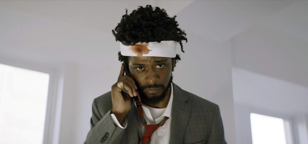 This image released by Annapurna Pictures shows Lakeith Stanfield as Cassius Green in a scene from the film, 'Sorry To Bother You.' (Annapurna Pictures via AP)
