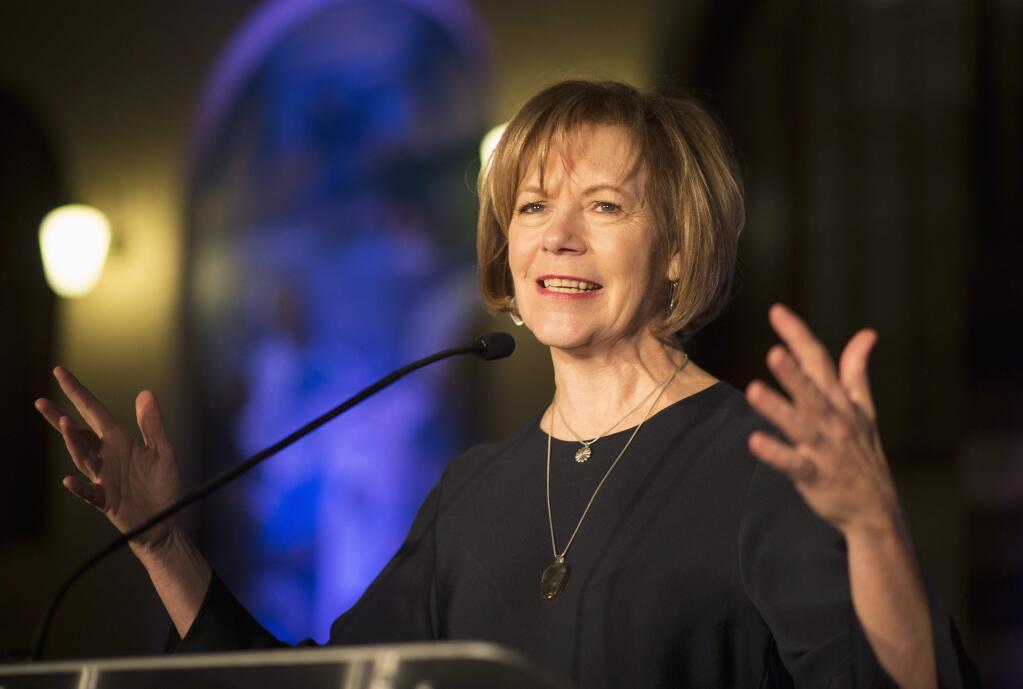 FILE - In this Jan. 10, 2015 file photo, Minnesota Democratic Lt. Gov. Tina Smith speaks to attendees at the North Star Ball in St. Paul, Minn. Minnesota Gov. Mark Dayton is set to name his choice to replace Al Franken in the U.S. Senate, with the top contender seen as Lt. Gov. Smith. Dayton was expected to make the appointment Wednesday, Dec. 13, 2017, nearly a week after Franken announced his plan to resign over allegations of sexual misconduct. (Aaron Lavinsky/Star Tribune via AP, File)