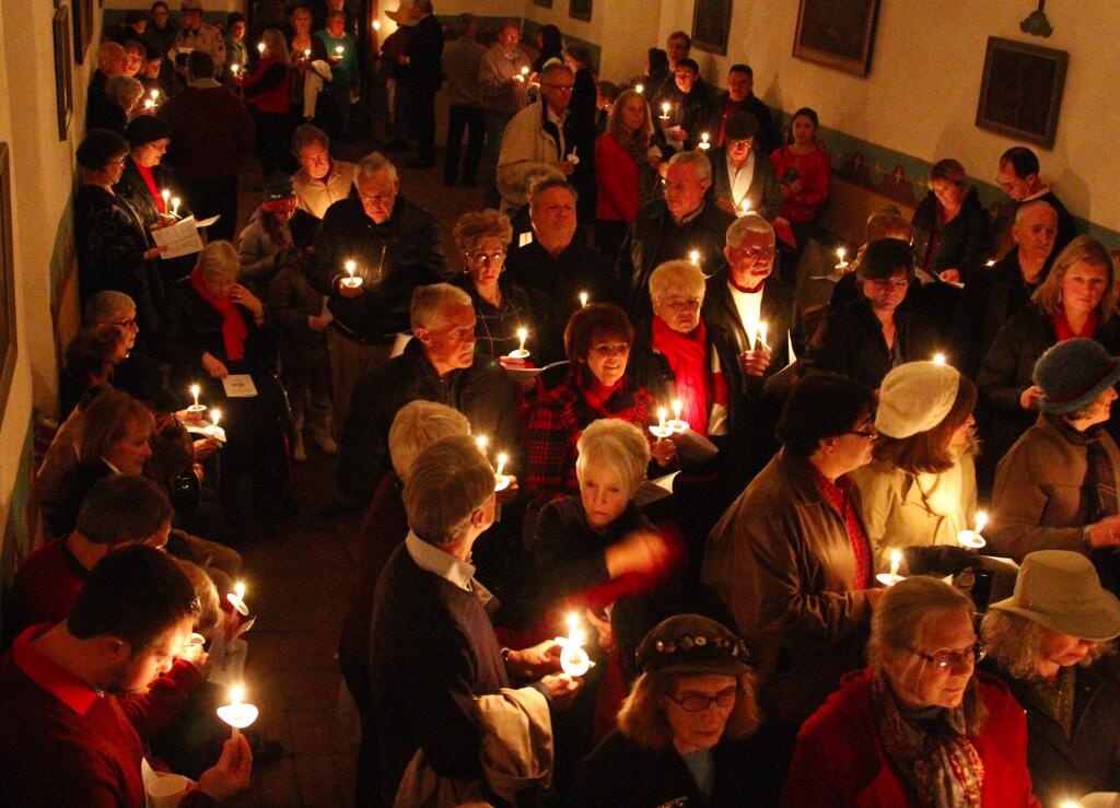 Bill Hoban/Index-TribuneChristmas at the MissionSeveral hundred people crowded into the Mission San Francisco Solano Saturday for the annual Christmas at the Mission celebration. The four programs this year began with Joseph and Mary knocking on the Mission's door seeking shelter and standing near the altar during the program. The candle-lit program featured readings from the Las Posadas pageant and traditional carols.