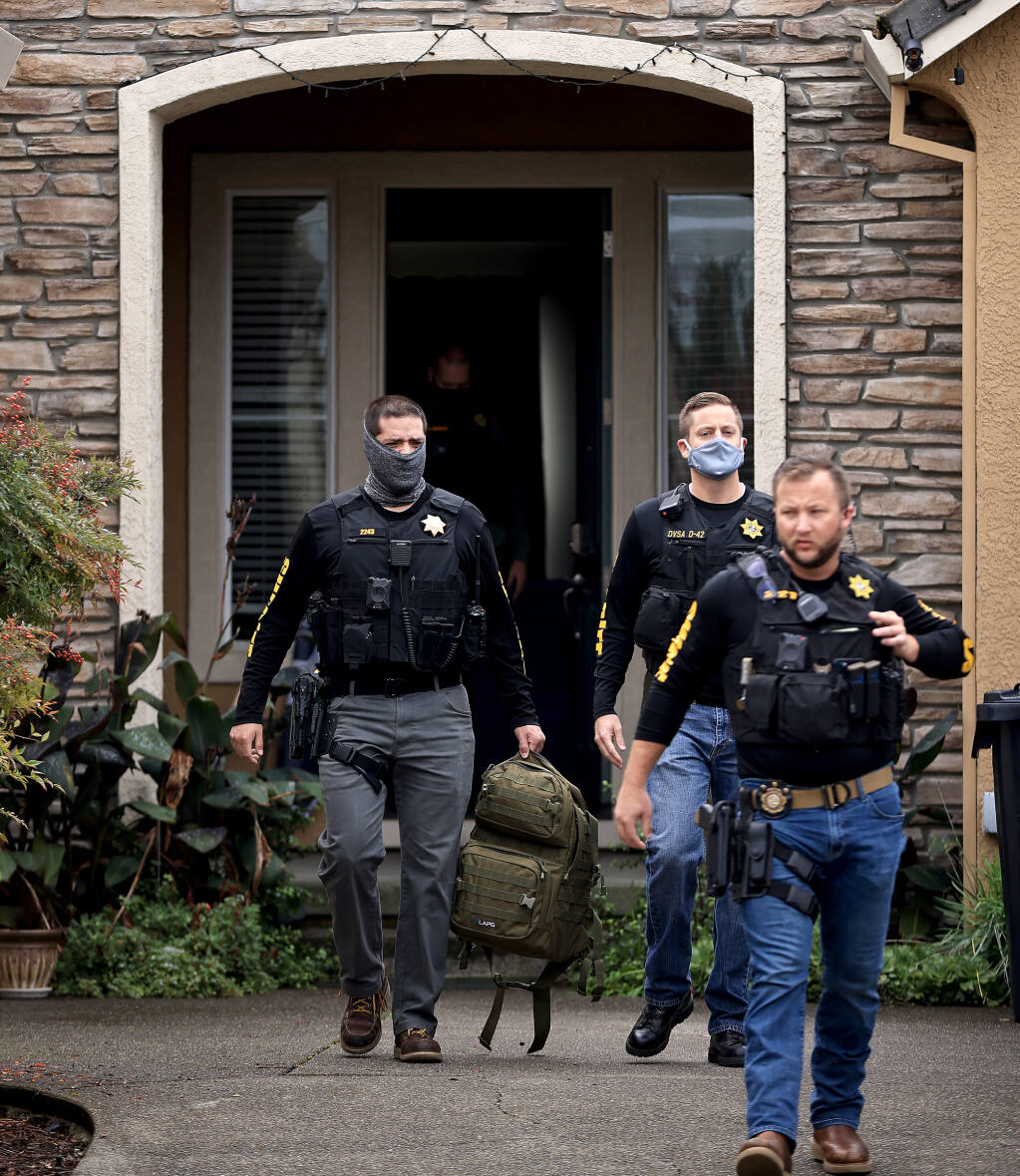 Detectives with the Sonoma County Sheriff's Department leave Dominic Foppoli's home in Windsor, Wednesday, Nov. 10, 2021. (Kent Porter / The Press Democrat) 2021