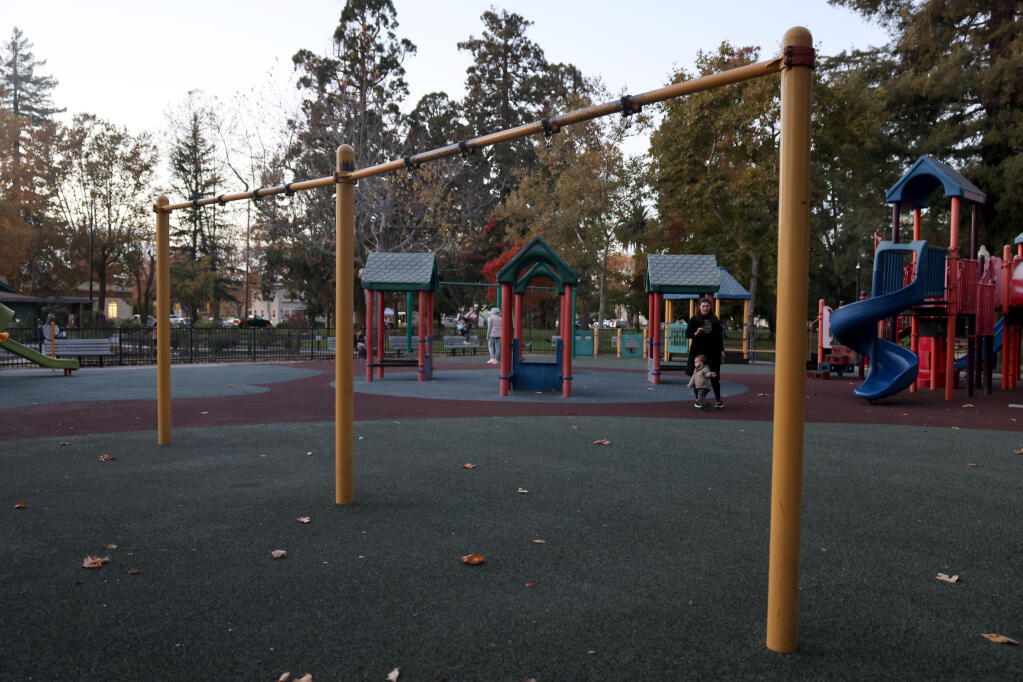 A structure with missing swings at the playground at Fuller Park in Napa, Tuesday, Nov. 28, 2023. (Beth Schlanker / The Press Democrat)