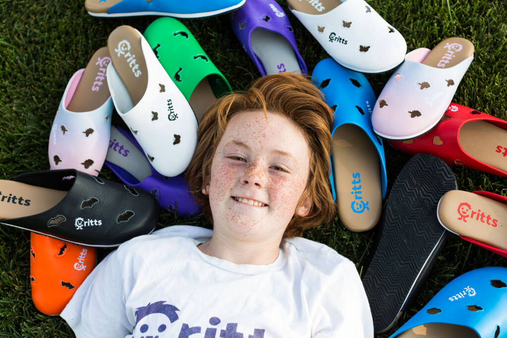 Carter Waugh, 11, has developed 204 options of his Critts shoe line. Photo by Sarah Risk.