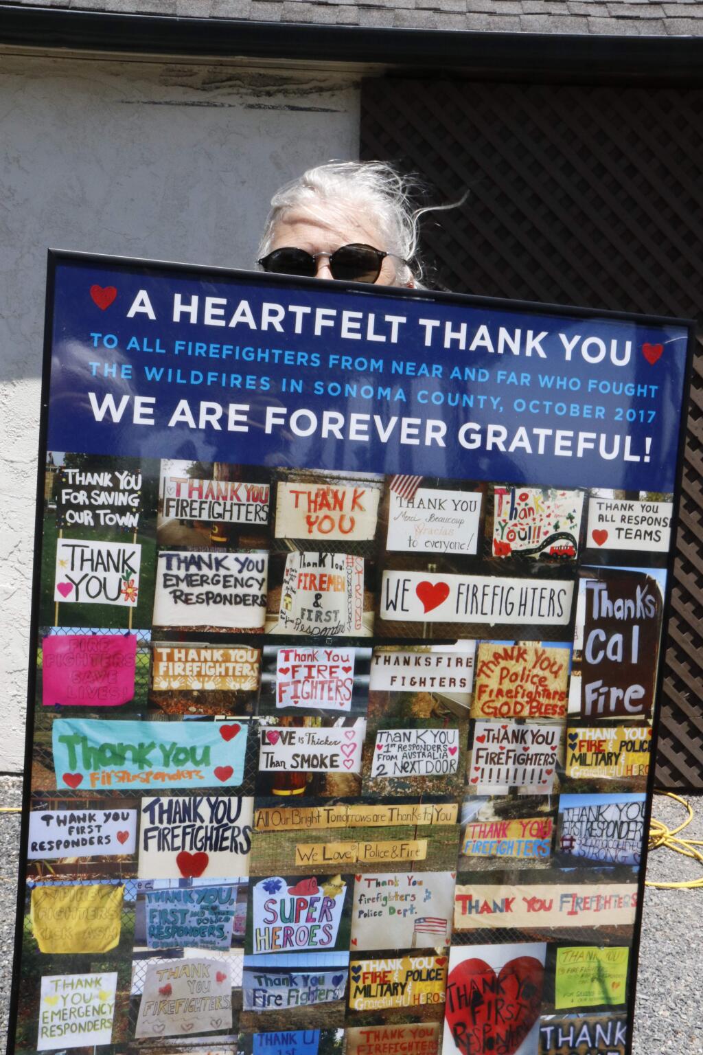 A display of cards from well-wishers to the Mayacamas Volunteer Fire Department is shared at the MVFD's annual community picnic, July 9, 2018. (Christian Kallen/Index-Tribune)
